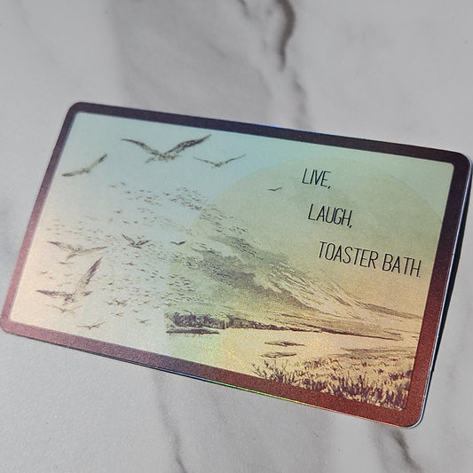 "Live, Laugh, Toaster Bath." Sticker